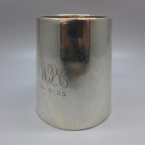 713 - A silver mug, with monogram dated 1925, 92g