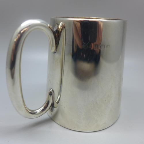 713 - A silver mug, with monogram dated 1925, 92g