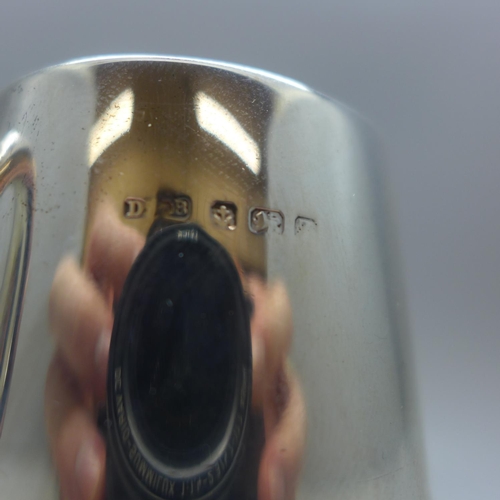 713 - A silver mug, with monogram dated 1925, 92g