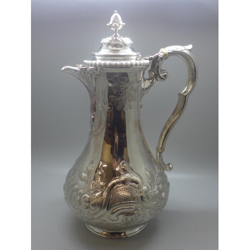 721 - A Victorian silver coffee pot, Sheffield 1851, maker R&H, 753g. This lot is offered for sale with no... 