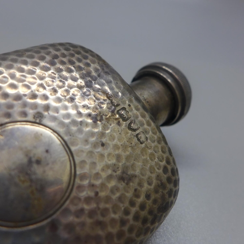 733 - A hammered silver hip flask, London 1899, 112g