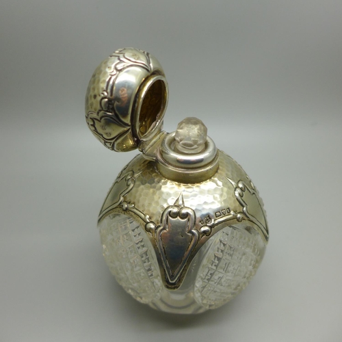 738 - An Arts and Crafts silver mounted glass perfume bottle, Chester 1905, 11cm