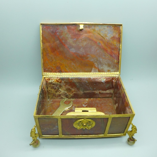 755 - A 19th Century gilt metal mounted agate panel box on globular agate feet, width of top 132mm