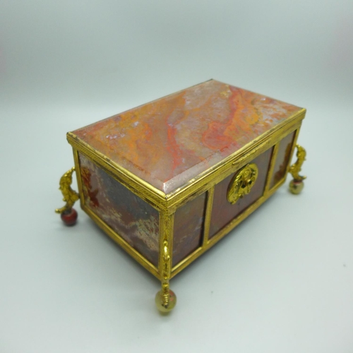 755 - A 19th Century gilt metal mounted agate panel box on globular agate feet, width of top 132mm