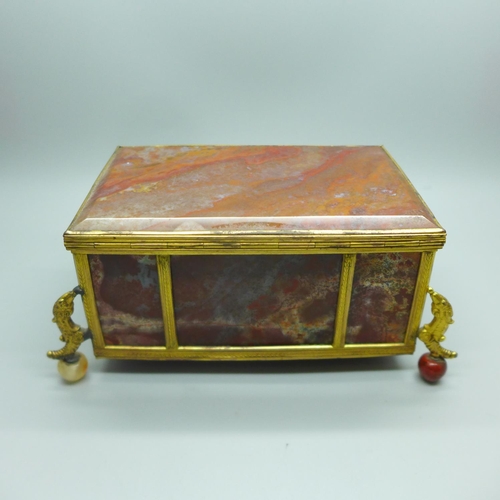 755 - A 19th Century gilt metal mounted agate panel box on globular agate feet, width of top 132mm