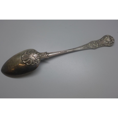 758 - A large George IV silver serving spoon with scroll back decoration, London 1828, maker CB, 169g