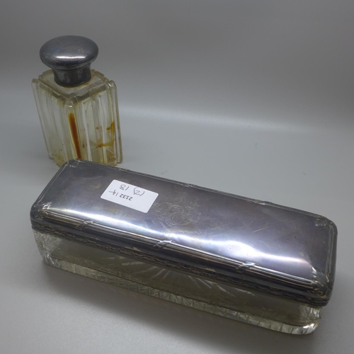 781 - A Victorian silver topped glass bottle, glass a/f, and a glass pen box with plated top