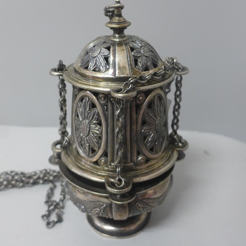 785 - A 19th Century white metal thurible with chains and suspension ring, 19cm