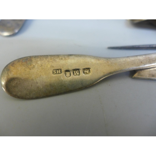 798 - A collection of silver and white metal flatware, etc., 1,145g of hallmarked silver