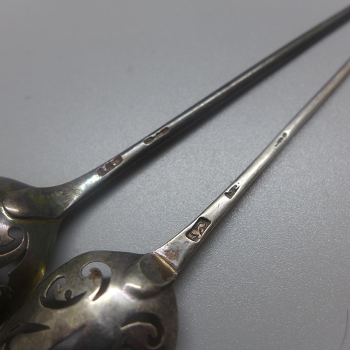 803 - Two Georgian silver mote spoons