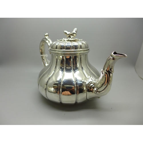 826 - A Victorian silver three piece tea service, London 1855 and 1860, maker BP, 1170g