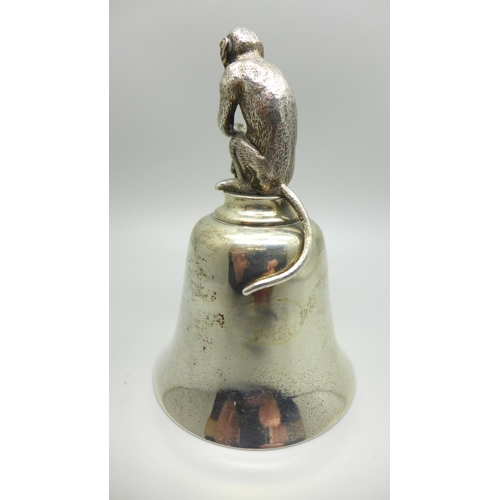 839 - A heavy silver hand bell with monkey handle, worn London mark, 263g, 10cm