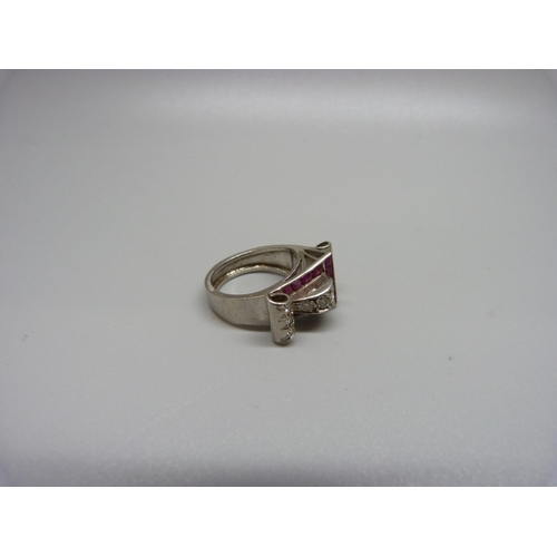 872 - A white metal, ruby and diamond ring, 10.4g, L