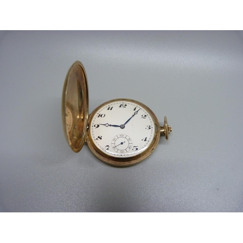 877 - A 9ct gold pocket watch, Glasgow import mark for 1927, total weight 55.6g, 45mm case