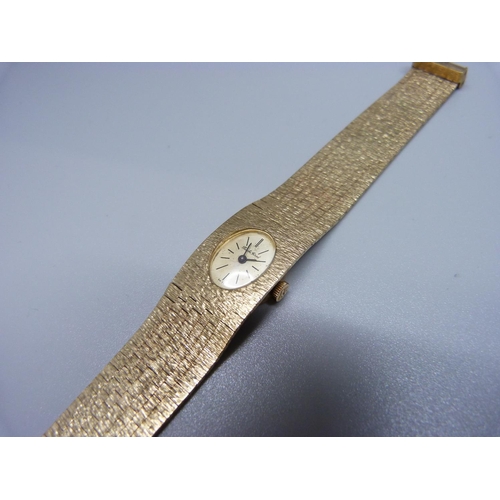 901 - A lady's 9ct gold Bueche Girod wristwatch, total weight 42.1g