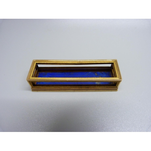 904 - A yellow metal casket with lapis lazuli base, lacking panels, length 61mm