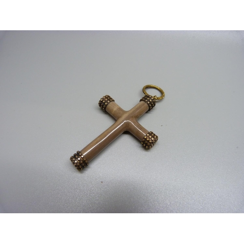 906 - A yellow metal mounted carved stone cross pendant, 42mm x 61mm