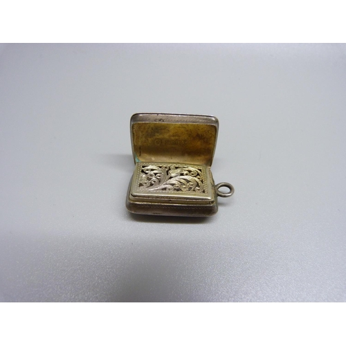 922 - A 19th Century silver vinaigrette by Nathaniel Mills, Birmingham mark, with attached loop