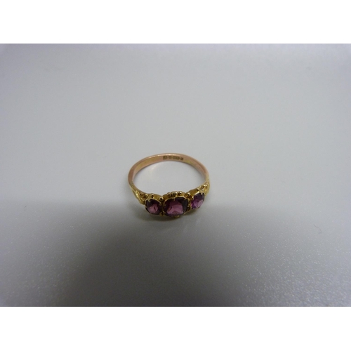 932 - An almandine garnet set ring, circa 1900 but with later 9ct gold half shank, 1.8g, N