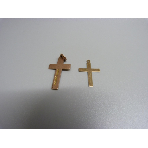 936 - Two 9ct gold cross pendants, 2.7g