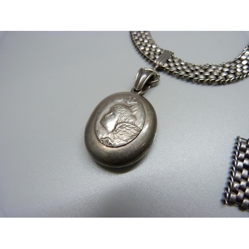 955 - A Victorian white metal locket and chain with spare links/section