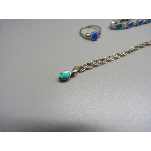 965 - A silver and synthetic opal bracelet, ring and a pendant and chain