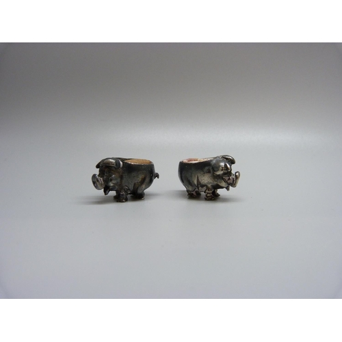 967 - Two small novelty silver pig pin cushions, one with full hallmarks, the other marked 925