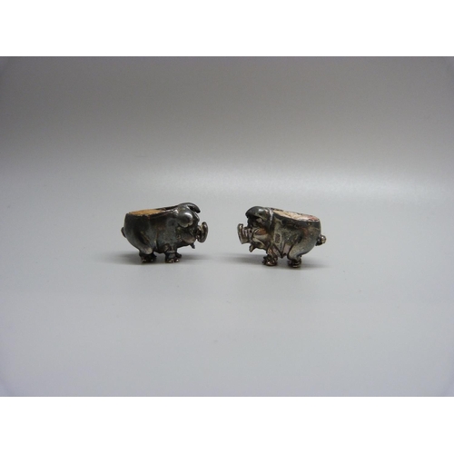 967 - Two small novelty silver pig pin cushions, one with full hallmarks, the other marked 925