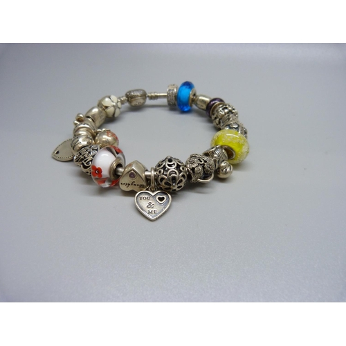 968 - A Pandora charm bracelet with silver charms