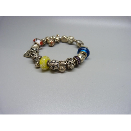 968 - A Pandora charm bracelet with silver charms