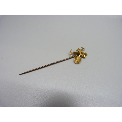 973 - A yellow metal mining stick pin, 2.5g, (tests as high carat gold)