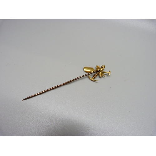 973 - A yellow metal mining stick pin, 2.5g, (tests as high carat gold)