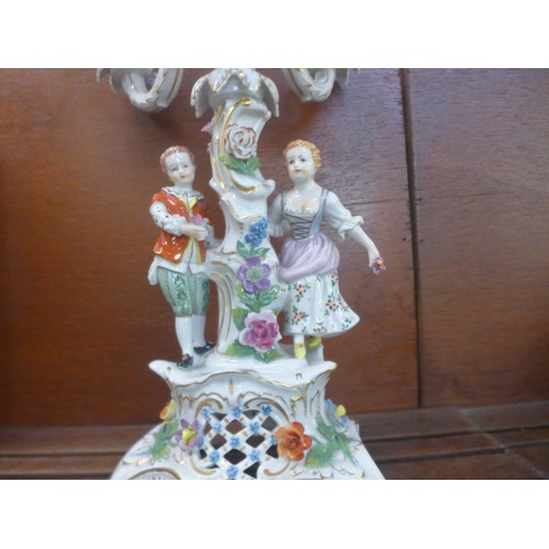 641 - A Dresden porcelain figural and floral encrusted candelabra, 48cm