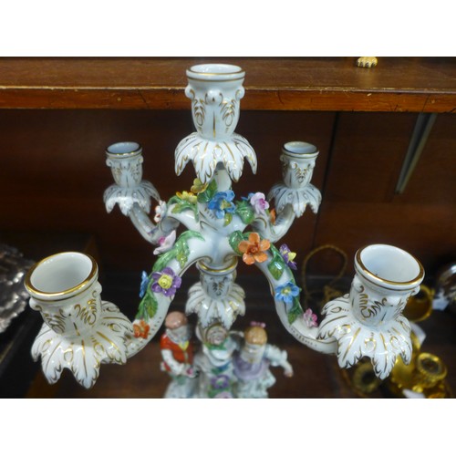 641 - A Dresden porcelain figural and floral encrusted candelabra, 48cm