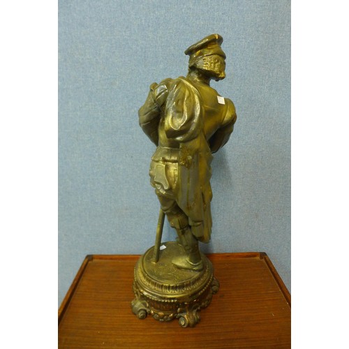 82 - A large continental gilt spelter figure of a soldier, 74cms h