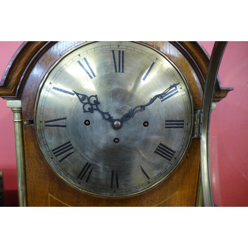 89 - A late 19th/early 20th Century inlaid oak musical boardroom clcok, with triple chain fussee movement... 