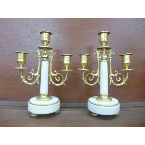 614 - A pair of 19th Century gilt bronze and marble double light candelabra, 26.5cm, one repaired