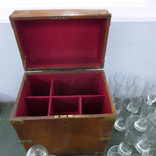 1125 - A box of mixed glass and a leather covered bottle box with red felt interior