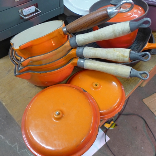 2058 - Job lot of cast iron and enamelled pans includes Le Creuset skillet and large pan