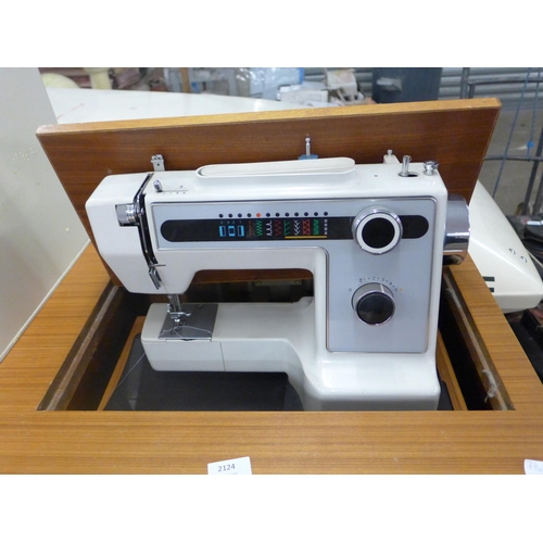 2124 - Crown Point programmable sewing cabinet with sewing machine