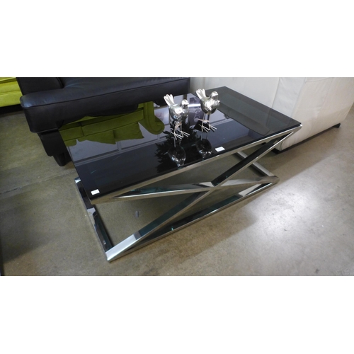 1336 - A chrome and black glass top coffee table