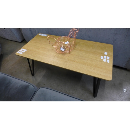 1340 - A Lutina coffee table, boxed