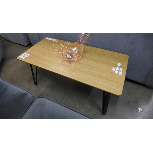 1342 - A Lutina coffee table, boxed