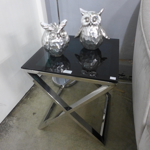 1347 - A chrome and black glass top lamp table