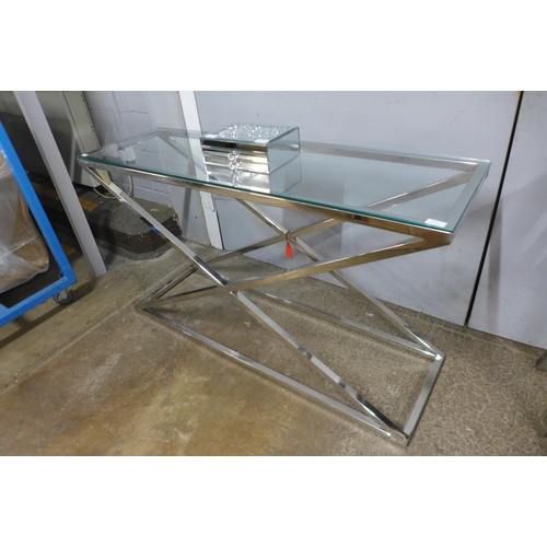 1425 - A chrome and glass top console table