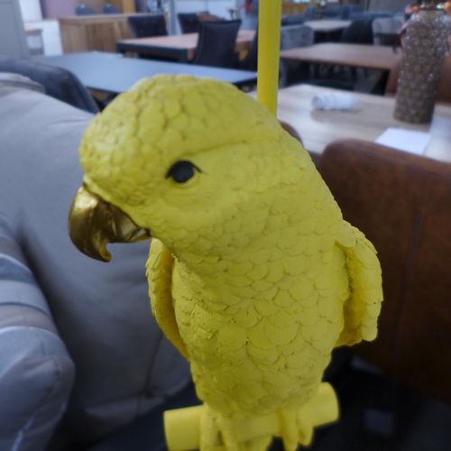 1471 - A yellow floor standing parrot lamp