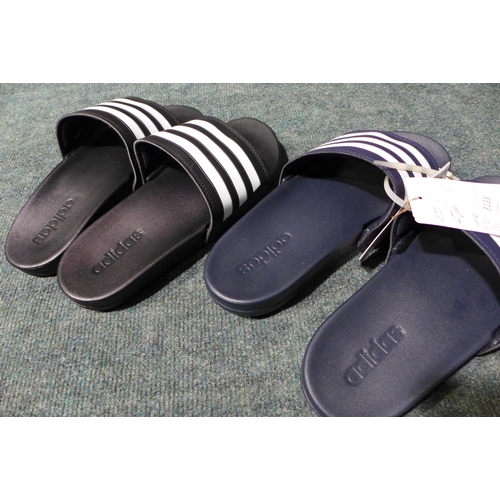 3133 - 2 Pairs of men's Adidas sliders - black (size Uk 7) and blue (size 8) - no boxes * this lot is subje... 