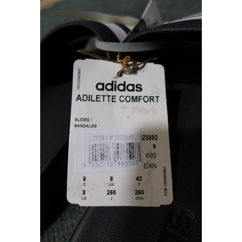 3133 - 2 Pairs of men's Adidas sliders - black (size Uk 7) and blue (size 8) - no boxes * this lot is subje... 