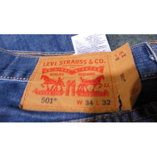 3169 - Three pairs of men's jeans, various sizes and styles, including one pair of Levi's * this lot is sub... 