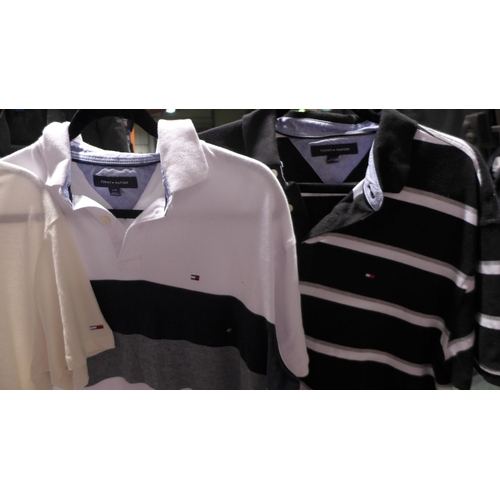 3187 - 3 Men's Tommy Hilfiger T-shirts, including two polo shirts, all size large * this lot is subject to ... 